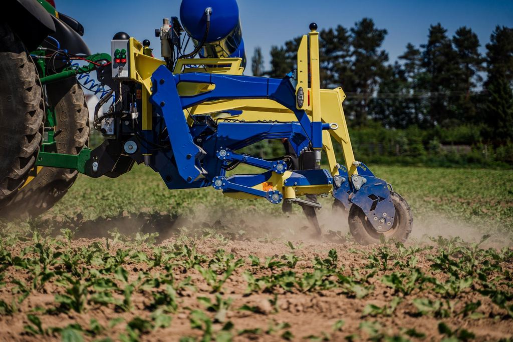 In-row weeder with AROW units in a sugar beet field